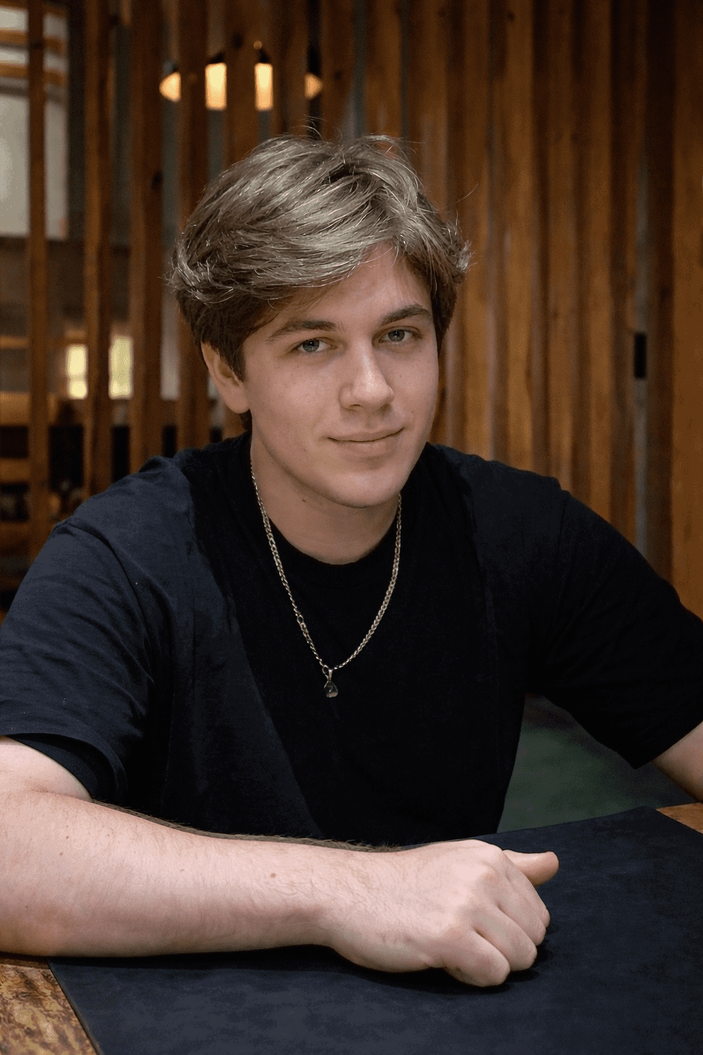 Young man with greenish-hazel eyes